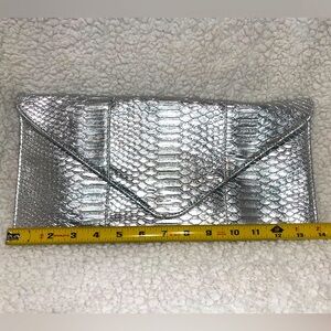 NWT silver faux snake skin print clutch